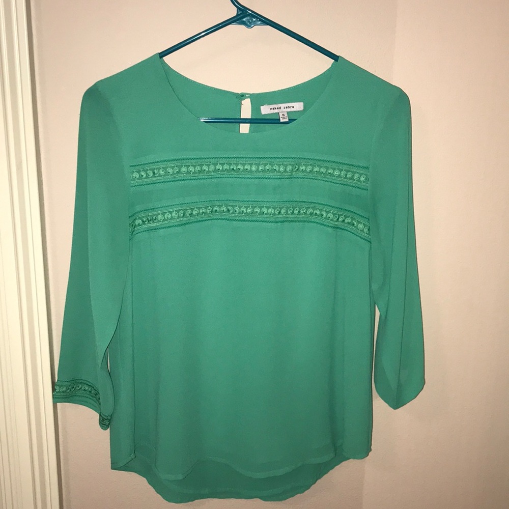 green top with a 3/4 sleeve